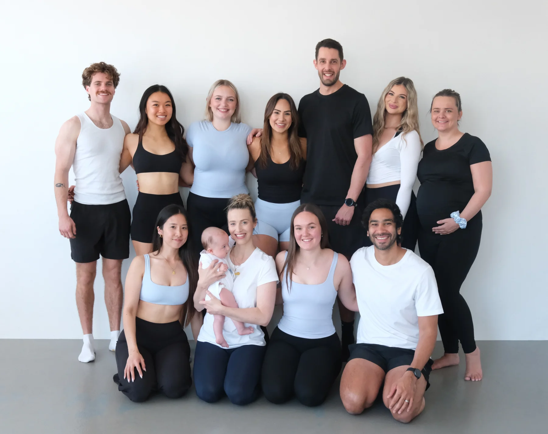 The Any Stage Pilates photoshoot group, with people at different stages of life